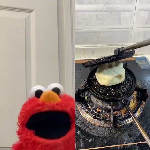 Cute Puppet Cooking Waffle on Griddle
