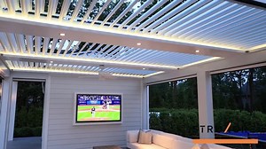 There is a hot new outdoor patio trend sweeping across Florida. Combine the best elements from a pergola, awning and patio roof with some fancy technology and this is what you get. This "smart" patio cover has motorized louvers that can open and close with your phone. Open up for a full blue sky. Or close for full shade cover. Or partially close for the perfect balance of shade and sun. Click the "learn more" button to get more info and see how people are transforming their outdoor patio spaces 