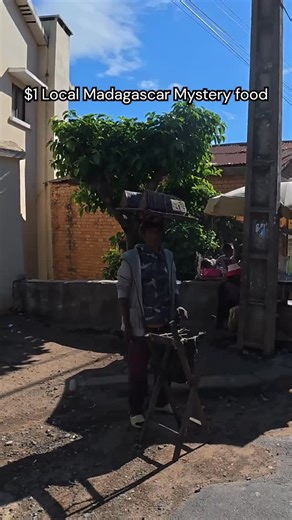 Harry Jaggard Reels on Instagram: "$1 Local Madagascar Mystery food 🇲🇬#madagascar #madagascar🇲🇬 #antananarivo🇲🇬"