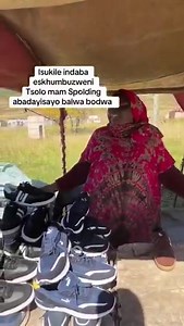 A Malawian street vendor swearing at a Zulu woman. | Operation Dudula SA Movement