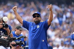 Rapper Ice Cube delivers World Series Trophy in style inside Dodger Stadium ahead of 2025 Opening Day