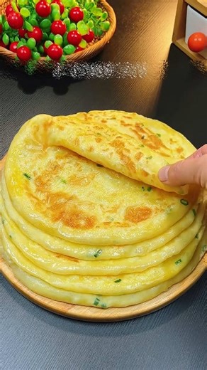 How to make crispy and flaky paratha in the easiest way Ingredients and recipe 3 cups All-purpose flour (or a mix of all-purpose and whole wheat flour/atta) 1 - 1.5 teaspoons Salt 1 tablespoon Oil or Ghee (clarified butter) About 1 cup Warm Water (adjust as needed) For Layering and Cooking: 1/2 cup Softened Ghee or Oil (for brushing) Extra dry flour for dusting Instructions 1. Making the Dough Mix Dry Ingredients: In a large bowl, combine the flour and salt. Add Fat: Add 1 tablespoon of oil or g