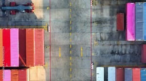 A container terminal or container depot, is a facility where shipping containers are stored and transferred between different modes of transportation, such as ships, trucks, and trains. Aerial view