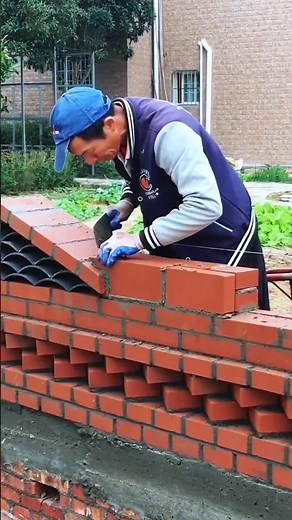 Brick wall construction with mortar application and alignment using a string line