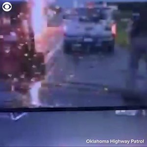 89K views · 24 shares | CLOSE CALL: Oklahoma Highway Patrol shared this video of a lightning strike that came dangerously close to a trooper on duty July 2. The trooper was out of his cruiser to help after equipment fell off a trailer, according to the department. | CBS Newspath | Facebook
