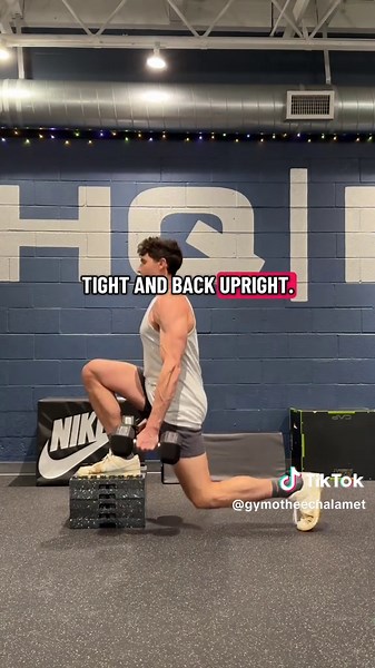 The Dumbbell Deficit Reverse Lunge is one of my favorite lunge variations. Here’s how I do it… • I elevate my front foot about 12” off the floor. • Keeping my core tight and back upright, I take a good-sized step backwards and control the descent. • I get my back knee as close to the floor as possible (it’s fine if my knee touches the floor but I don’t let it bang). • I get my hamstring to calf on my front leg. • Finally, I return to the starting position, keeping my back foot off the box the en