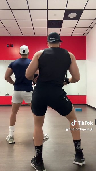 Intense Workout Session Between Two Athletic Men