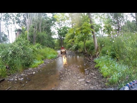 mudding + trail riding the polaris hawkeye 300