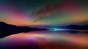 Download AI generated Beautiful sunset with rainbow over the calm sea and lake for free