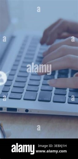 Vertical video: Woman typing on laptop keyboard, causing avatar dots and lines showing tech network. Hands, closeup, office, computer, overlay, data, vertical video Stock Video Footage - Alamy