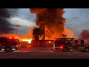 Large Structure Fire Engulfs Building in Adelanto, California