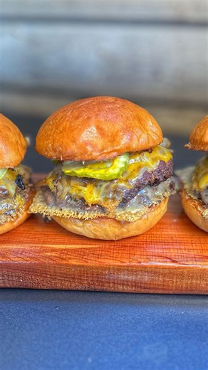 @Toddtoven puts the brand new Blackstone smash burger accessories to work, showing how to build the ultimate double smash burger from start to finish. From perfectly smashed patties to crispy edges, melted cheese, and toasted brioche buns, this is smash burger cooking at full throttle. Stick around for Todd’s tips, favorite tools, and why this seasoning might surprise you. - Watch the full video on our YouTube channel. - Ingredients 1–1½ pounds 80/20 ground beef 3 brioche burger buns Butter, sof