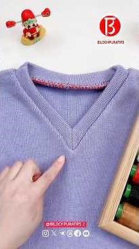 Cut the turtleneck and replace it with a V-neck