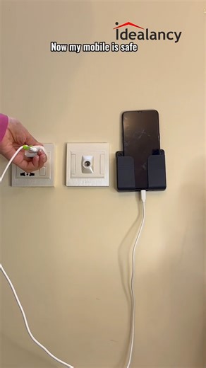 Mobile Phone Charging Holder - Wall Mounted Keep your phone secure and charged with our wall-mounted charging holder. Perfect for organized charging! #PhoneHolder #WallMounted #organizedliving | Idealancy