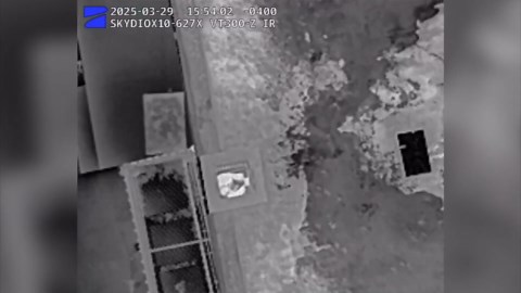 RAW VIDEO: Drone spots man stuck in chimney; officers rescue, arrest him