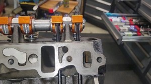 Looking at pushrod cup adjustment on these Harland Sharp roller rockers. HS says no more than 3 no less than 2 threads showing when determining pushrod length. I have an 8.100 on one side and an 8.200 on the other side. Both of these will work. However using an 8.150 is going to result in the best of both worlds!! | Steve V's Automotive