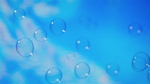 Many bubbles with a blue blur background moving - Free Stock Video