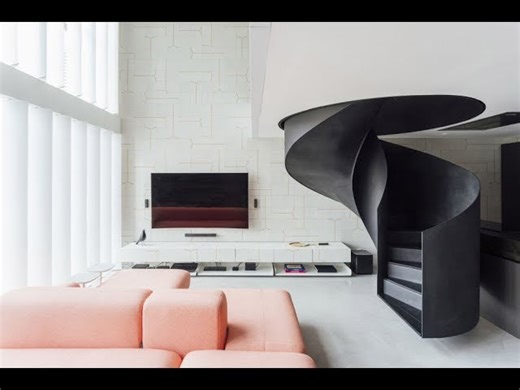Stylish loft apartment reinvented by a spiral staircase