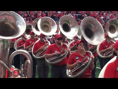Former band director Jon Waters breaks down during Carmen Ohio