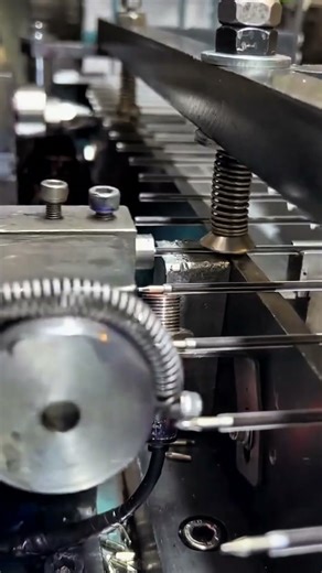 A pen making machine operating precisely to produce smooth durable pens efficiently and consistently