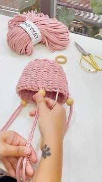 Creating a basket-style plant hanger with weaving techniques using 5mm cord. #weaving #macrame