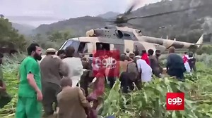 Wounded moved to helicopters in Kunar Province after earthquake strikes