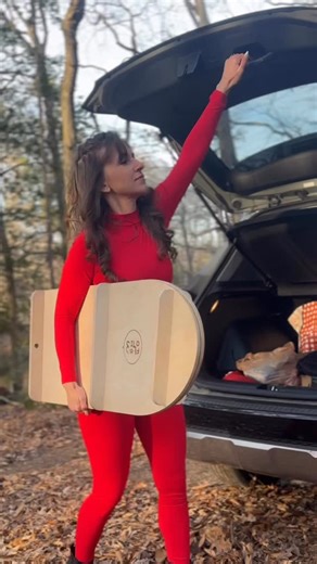 After a full day of homeschooling, coaching, and mentoring… I change into a bright red unitard and bring down the sun 🤘😝😎🌞❤️…on a @wild_flow_yogaboards | Selena Kipnis