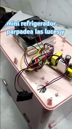 Mini refrigerator flashes lights and does not cool (solution)