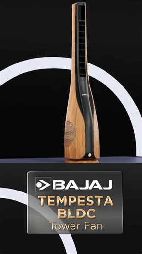 Experience quiet luxury with the Bajaj Tempesta BLDC Tower Fan. Its 30W motor saves over 50% energy while staying whisper-quiet. Wrapped in a sleek wooden finish, it features 12-speed control, remote access, dual washable filters, and an aroma box for smart cooling. #BajajElectricals #BajajBuiltForLife #TempestaTowerFan #ModernCooling | Bajaj Electricals Ltd.