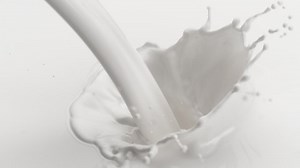 clip-1076738084-super-slow-motion-milk-splash-isolated-on
