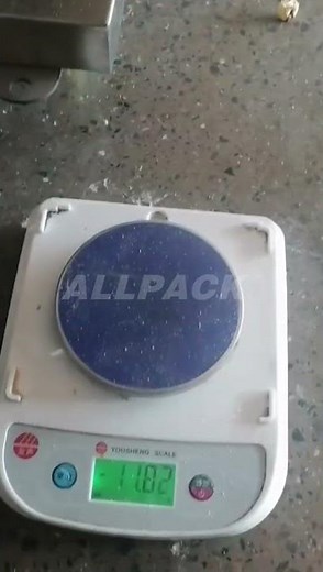 How vertical packing machine with measuring cup feeding and back seal works?