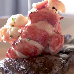 Hand-cut by our in-house butcher, our steaks pair exquisitely with butter poached lobster tails. | The Capital Grille