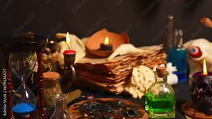 Mystic occult witchcraft background, focus shift, witch craft tools, old yellow parchment grimoire weathered pages, magic ritual. Halloween theme, goat jaw bones, black candles, raven toe for spells