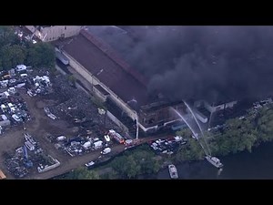 Firefighters battle massive warehouse fire in Tacony section of the city