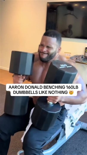 Aaron Donald is causally benching the weight of a grown human with each arm 😭 (🎥: @Aaron Donald #aarondonald #weightlifting #nfl #gym #rams