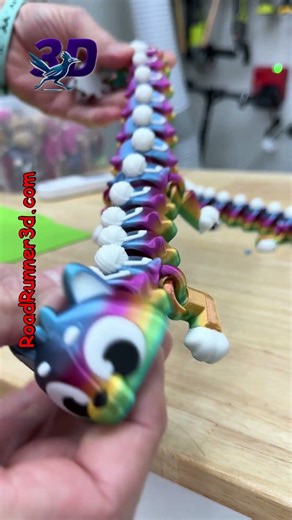 Silky Rainbow Cat Dragon with a Mouse on the Tail