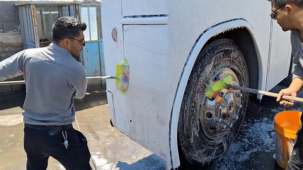 Thorough Cleaning For A Dirt-Covered Bus