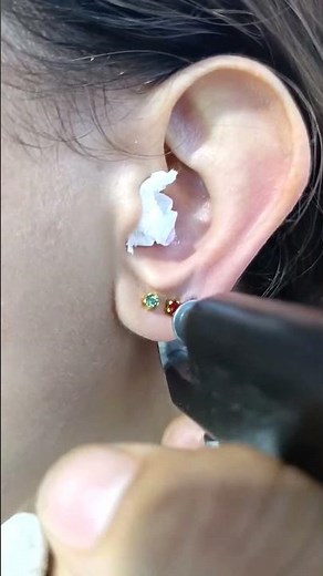 Young Moroccan Woman Gets Her Ear Triple Pierced In One Sitting