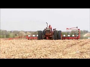 IH 1466 planting with a White 12 row planter
