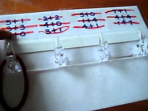 Preschool - Math: Addition practice game with hooks and elastics. Skip count by 3's.