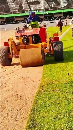 Professional installation of turf at a football stadium