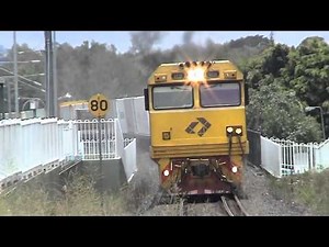 Aurizon 2800 GE's depart Norman Park Station