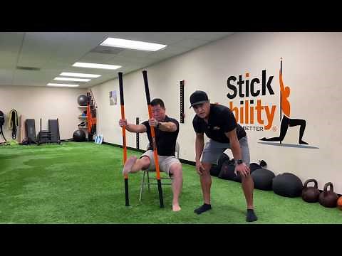 Seated Hip Rotation Stretch - Stick Mobility Chair Exercises