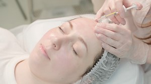 Cosmetologist Performing Facial Injection Procedure | Premium Stock Video Footage