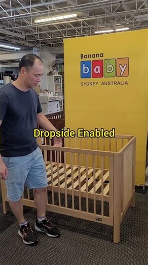 Babyhood Aliya Rattan Cot assembly. You can enable or disable the dropside