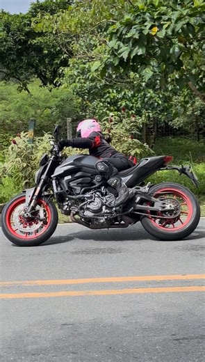 The Ducati Monster 937 is a liquid-cooled, 937 cc naked motorcycle known for its agile chassis, 111 hp engine, and rider-friendly electronics like riding modes and a standard quickshifter. It features a lightweight aluminum frame, a hydraulic clutch, and is available in multiple variants, including the Plus and the special 30 Anniversario edition. | MotoSkrt