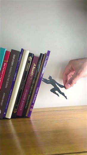 Superman Is Holding My Books From Falling 😳🦸‍♂️