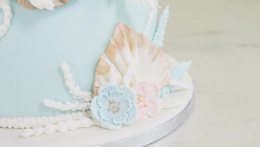 1.5K views · 56 reactions | See how to make a stunning two-tier Palm Spear cake quickly and easily with our beautiful moulds  www.karendaviessugarcraft.co.uk | Karen Davies Sugarcraft | Facebook