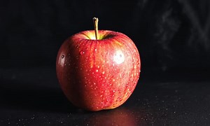 Download Red Apple on Dark Background for free