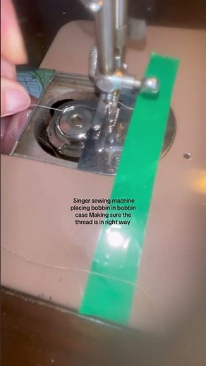 Singer sewing machine placing bobbin in bobbin case Making sure the thread is in right way